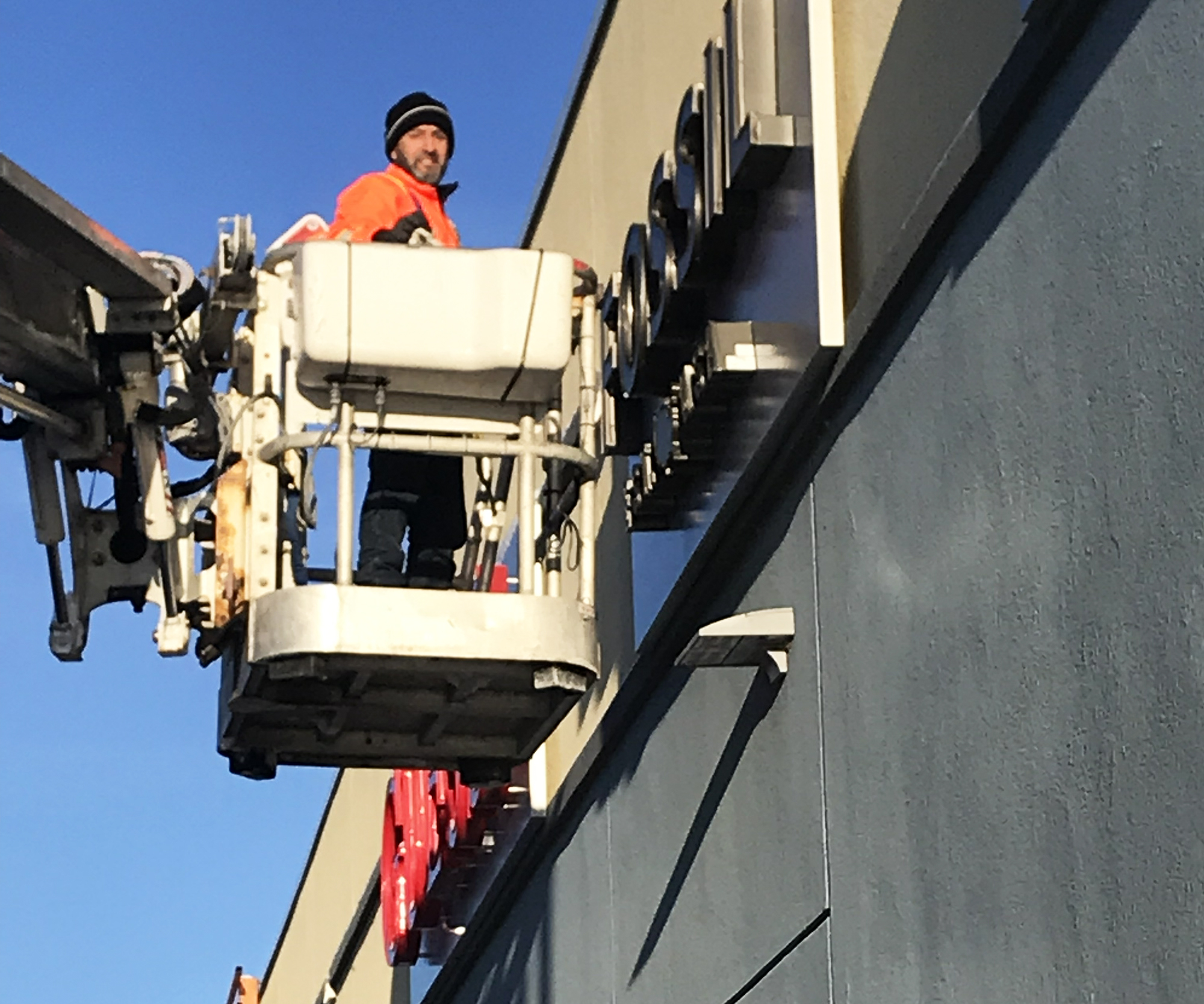 LED sign installation Ottawa field team — DSign LED winter