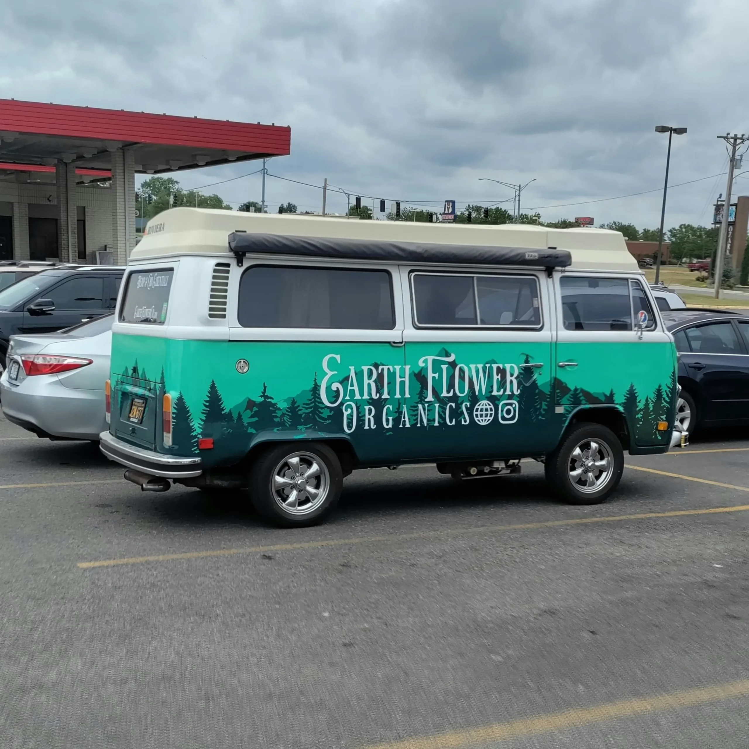 Custom full vehicle wrap on VW van with branded graphics designed by DSign LED Ottawa