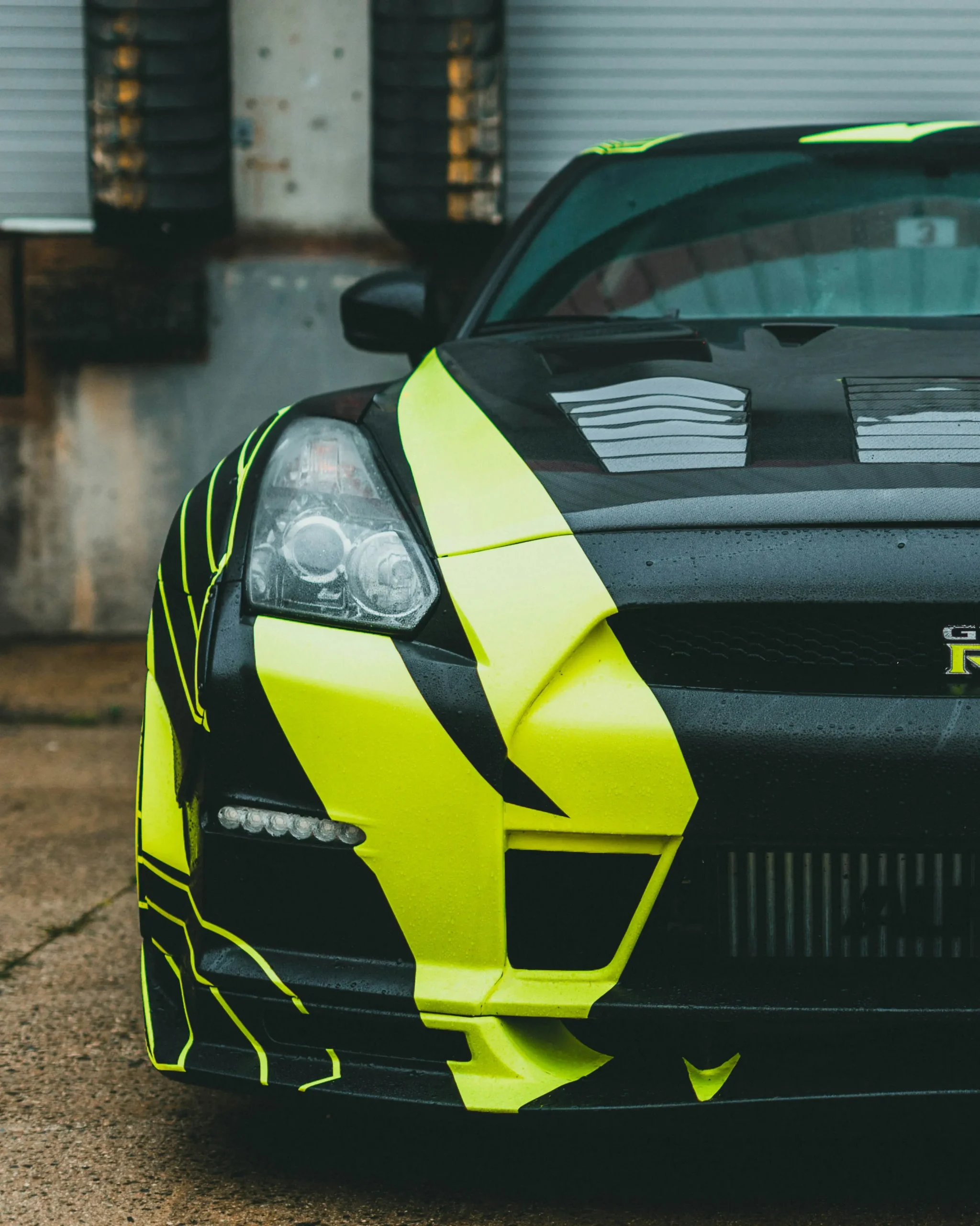 Full colour neon and black custom car wrap on sports car by DSign LED Ottawa